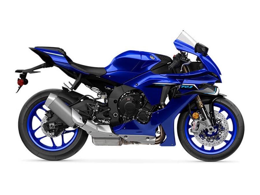 Leon Thomas grammy contender on stage with a Yamaha YZF-R1-inspired backdrop, symbolizing speed and agility in the music industry